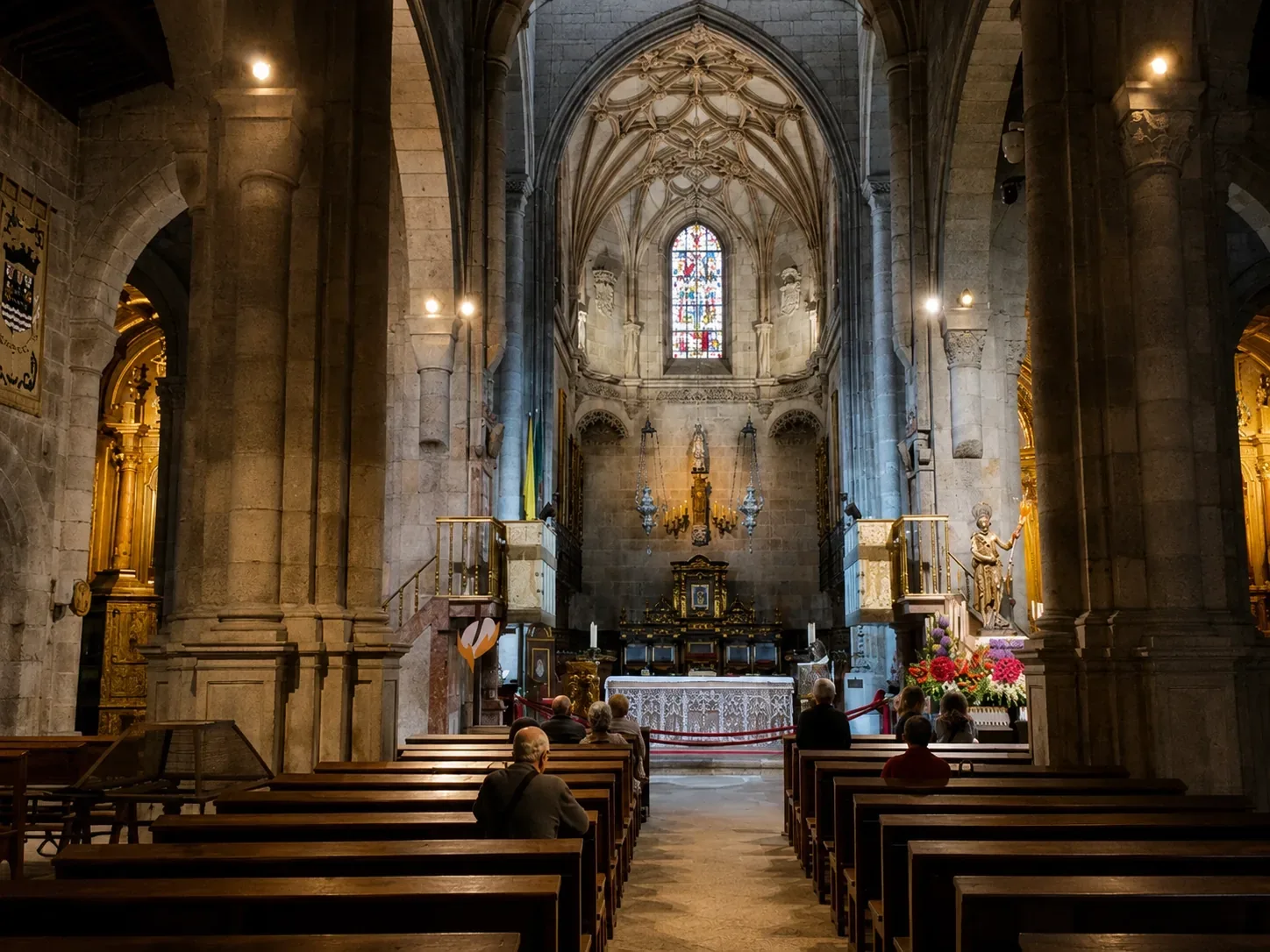 The Romanesque facade and baroque bell towers of the Sé de Braga (Braga Cathedral) — Portugal's oldest cathedral, constructed from 1070 under orders of Henry of Burgundy, showing the characteristic mix of Romanesque, Gothic, Manueline and Baroque architectural layers accumulated over nine centuries of continuous use and embellishment