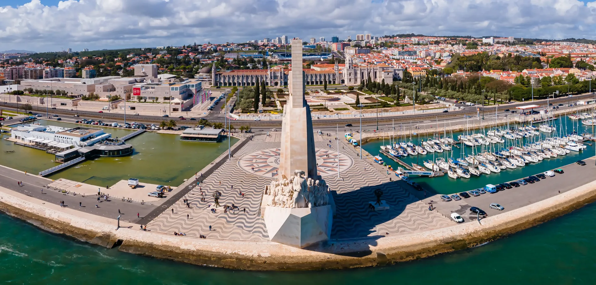 Padrão dos Descobrimentos — the Monument to the Discoveries on the Belém waterfront of the Tagus River, a 52-metre concrete sculpture in the form of a caravel's prow bearing 33 figures of the Age of Discoveries including Henry the Navigator at the front, with an optional panoramic elevator to the top