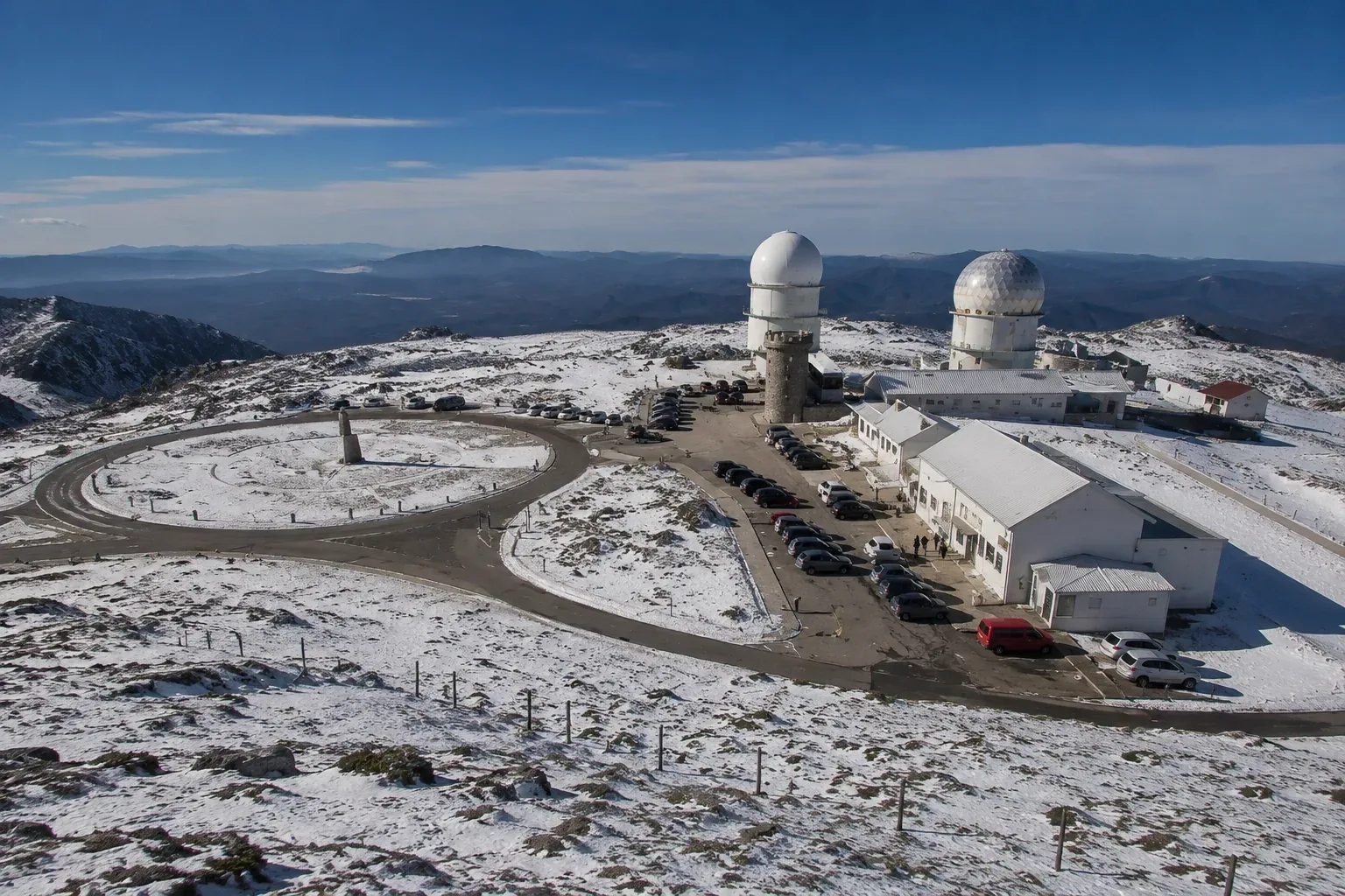 Serra da Estrela in winter — snow-covered peaks and Penhas da Saúde ski resort plateau in the highest mountain range in mainland Portugal